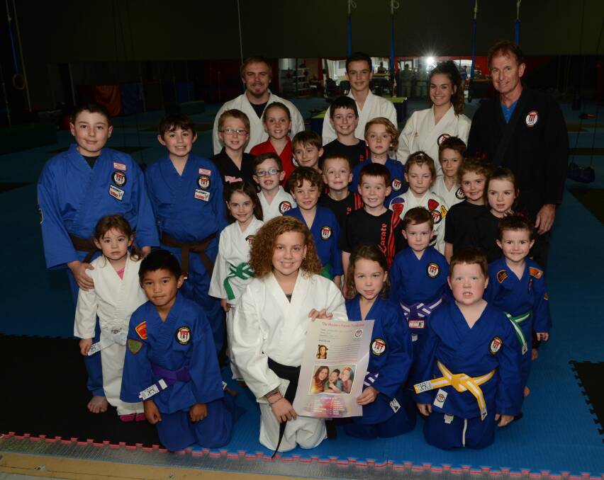 COMMUNITY SPIRIT: Sports Karate Australia in Bathurst is doing their bit to help out a local family close to their hearts, with the Masters’ Family Fundraiser on Sunday. Photo: PHILL MURRAY	 052015pmasters