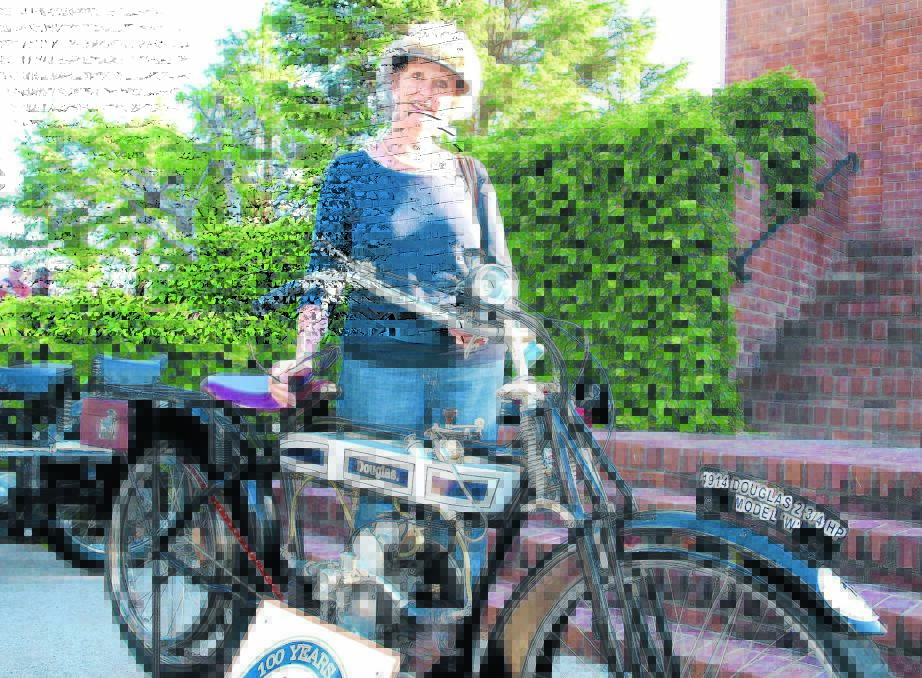 LONG HISTORY: Lindsay Douglas, great great granddaughter of the original builder of the Douglas motorcycle John Douglas, was on hand at the Bike Show in Kings Parade on Saturday. Photo: ZENIO LAPKA. 110714zdouglas6