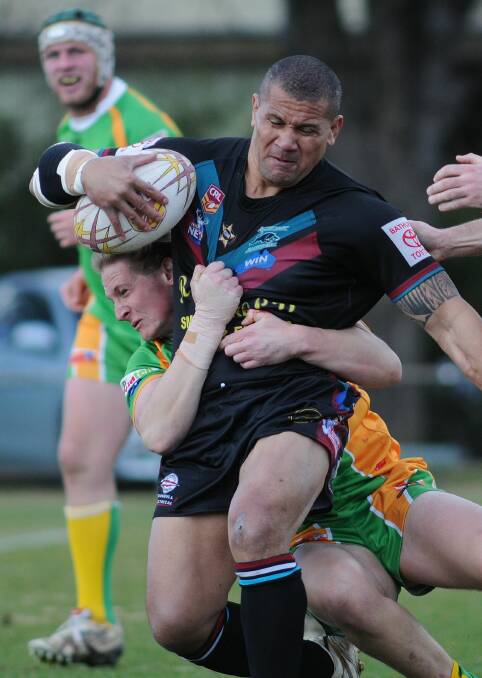 STILL HOPEFUL: While Saturday’s loss to CYMS was a hit to their claims, Panthers captain-coach Brian Moss still believes the men in black, including Stan Latu, pictured above, can win back-to-back titles. 
Photo: Steve Gosch 	0823sgcyms2