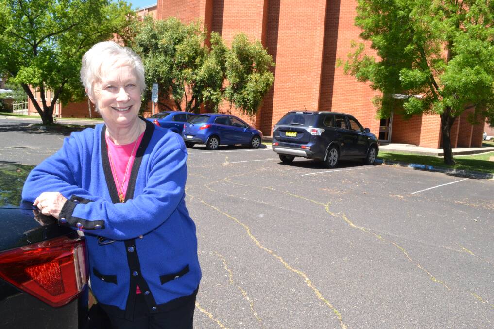 NO MORE PARKING WORRIES: Dean Anne Wentzel of All Saints’ Cathedral is leasing parking spaces in the cathedral car park to people who are tired of fighting to find an all-day car park in Bathurst’s CBD. Photo: BRIAN WOOD 	102214parking