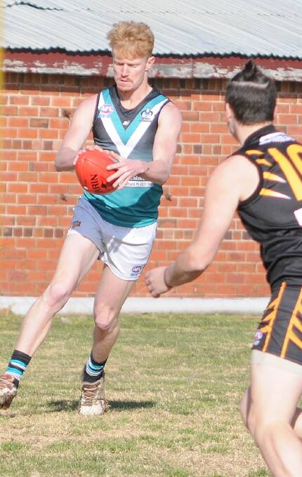 OUTCLASSED: Peter Grundy top scored for the Bathurst Bushrangers in their 59-point defeat to the Orange Tigers on Saturday in the Central West AFL competition. Photo: STEVE GOSCH  0725sgafl1
