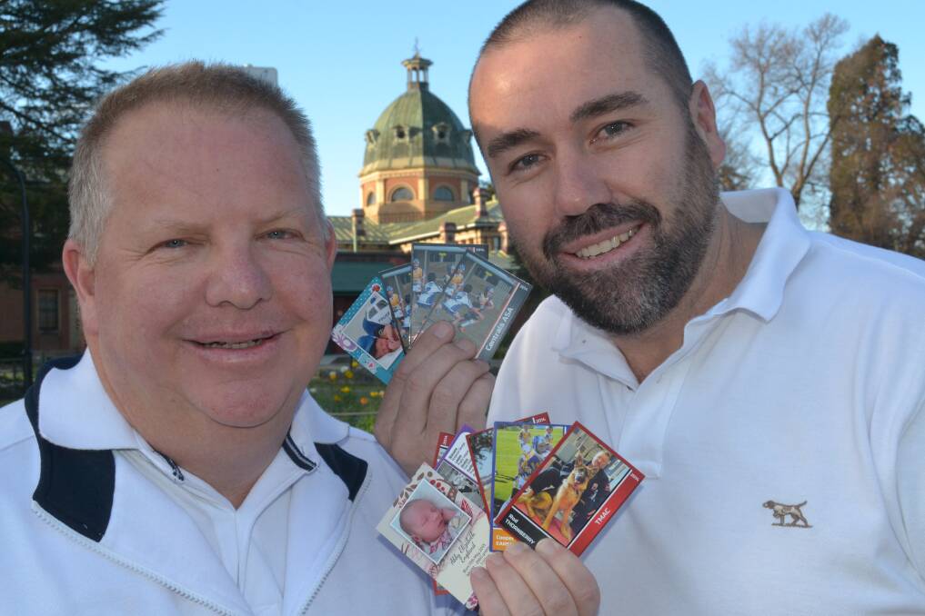 STAR POWER: Mick Whittaker and Shane Earsman will launch their Shooting Star sports cards business at the Bathurst City Community Club tonight. Photo: BRIAN WOOD 082114cards