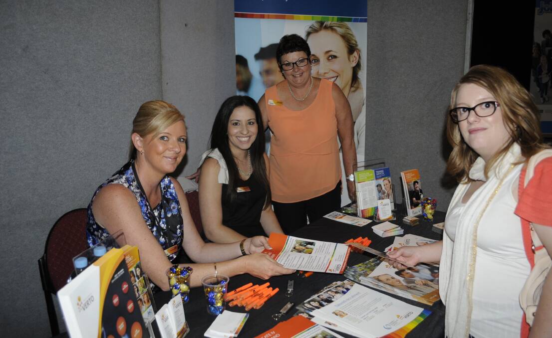 BUSY DAY: Tamar Hanrahan, Maria Meyers and Wendy Dwyer from VERTO were ready to help job seeker Evelyn Sowter, among many others, at the Bathurst Jobs Expo. Photo: CHRIS SEABROOK  112514cjobs1