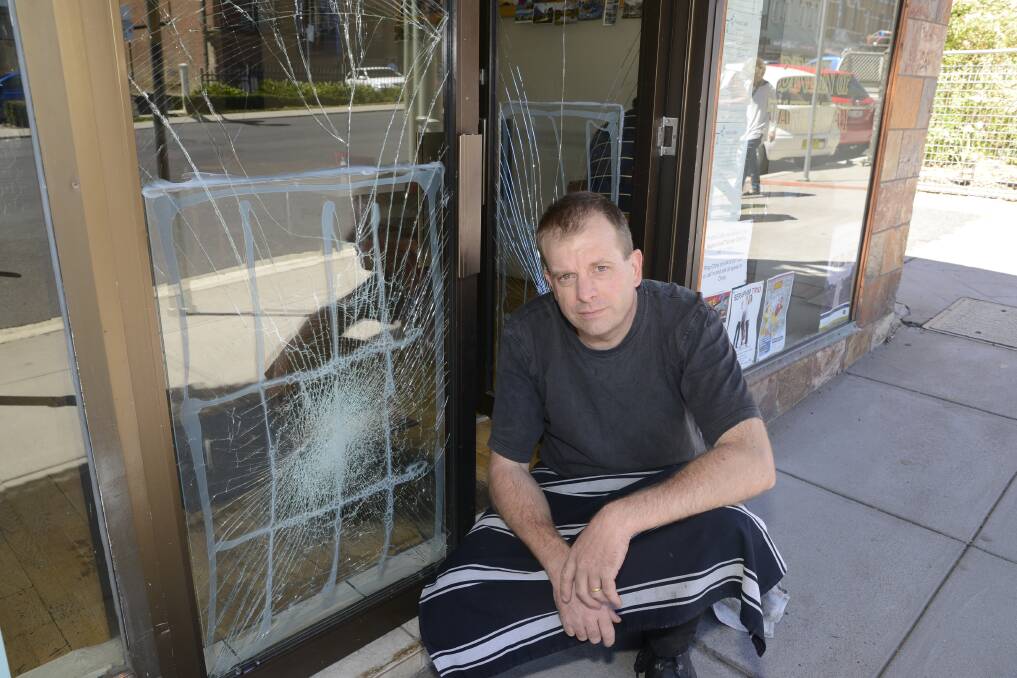 DISHEARTENED: Porters Cafe owner Chris Bergen has joined the call for CCTV in the CBD after his store fell victim to a malicious damage attack on Friday night. Photo: PHILL MURRAY 030715pchris