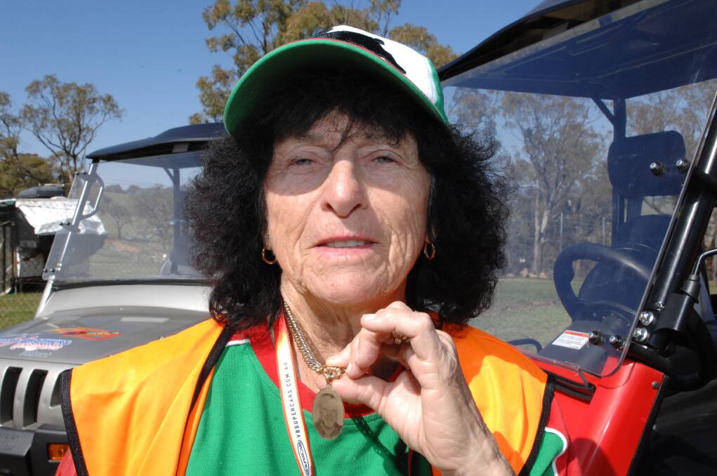 STAYING CLOSE: Bathurst 1000 volunteer Carol Cameron continues to escort campers to their sites on Mount Panorama where her husband Max died 14 years ago. 100614zmount4