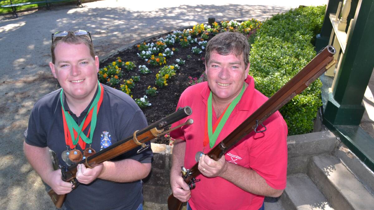 AIM, FIRE: Shayne and Glenn Barnsley are currently in Adelaide for the SSAA Muzzleloading Championships which get underway on Saturday. Photo: CHRIS SEABROOK 100112cmuzzle1