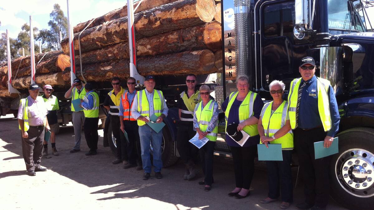 BIG INVESTMENT: Forestry Corporation of NSW joined a delegation of Oberon Council staff and councillors and representatives from the region’s major timber processors Highland Pine Products and BORG to inspect the new fleet at Mangan Haulage.032014truck