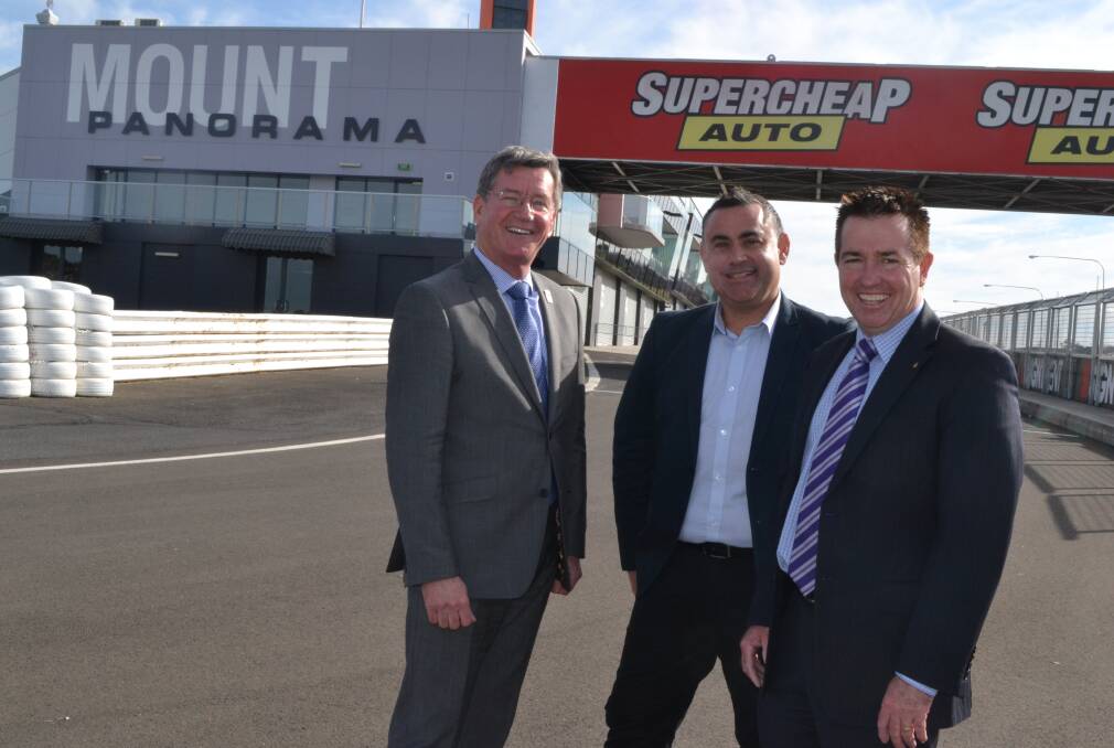 ENDLESS OPPORTUNITIES: Bathurst mayor Gary Rush, Minister for Regional Development and Small Business John Barilaro and Member for Bathurst Paul Toole discuss how a second circuit at Mount Panorama would boost jobs growth. Photo: LOUISE EDDY 	073015plejohn