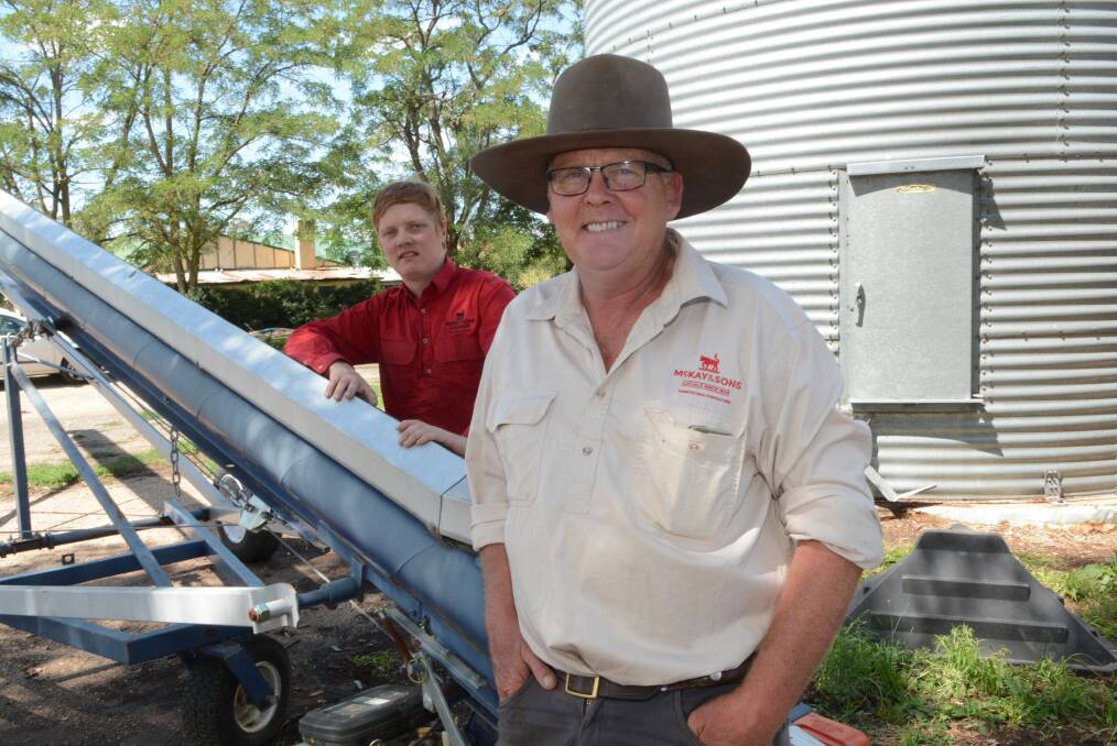 HEAVEN SENT: NSW Farmers Association Bathurst branch president David McKay (on right), pictured with his son Hugh, said the region’s farmers are beaming after above average rainfall in January has left them with a perfect start to the season. Photo: PHILL MURRAY 012916pmckay