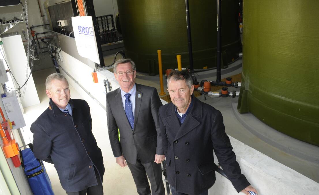 MONUMENTAL OCCASION: Bathurst Regional Council’s manager of water and waste Russell Deans, left, Mayor Gary Rush and Bruce Goddard from EODO, inside the new plant that is expected to solve Bathurst’s dirty water woes. Photo: CHRIS SEABROOK 080315cwater2