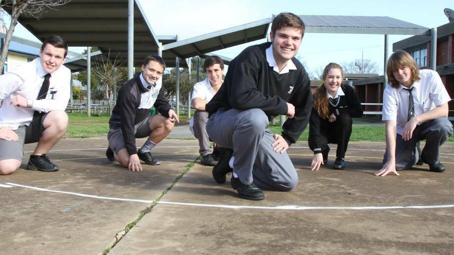 Students Adam Mitchell, Lane Smith, Marcello Carvalho, Mackenzie Saddler (project designer), Hannah Boardman and Jack Robbie where the tribute will be built. Photo: THE IRRIGATOR