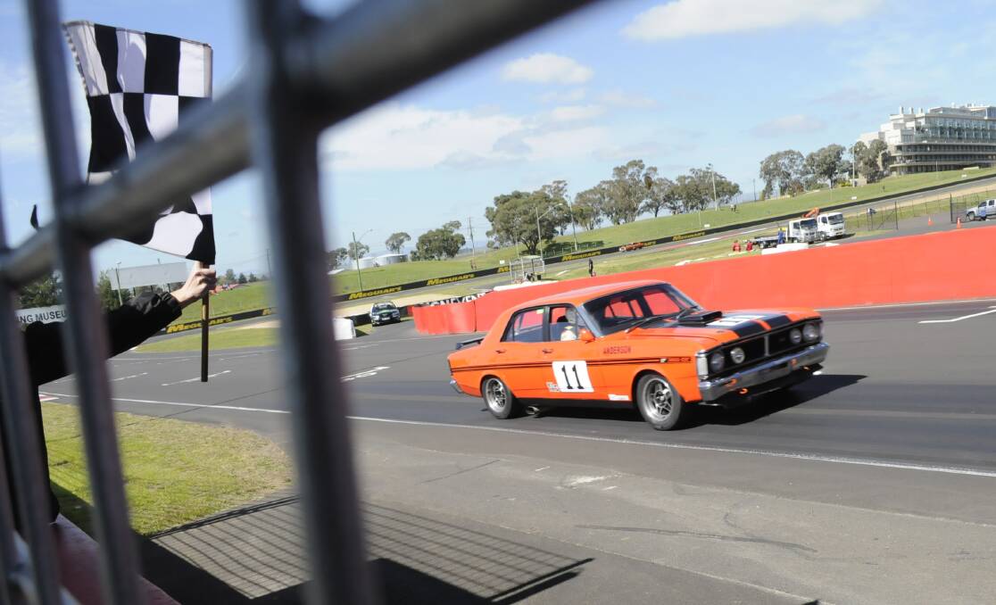 Bathurst Motor Festival: Second place was Michael Anderson (from NSW) in  a Ford  Falcon  XY GTHO  Phase 3.