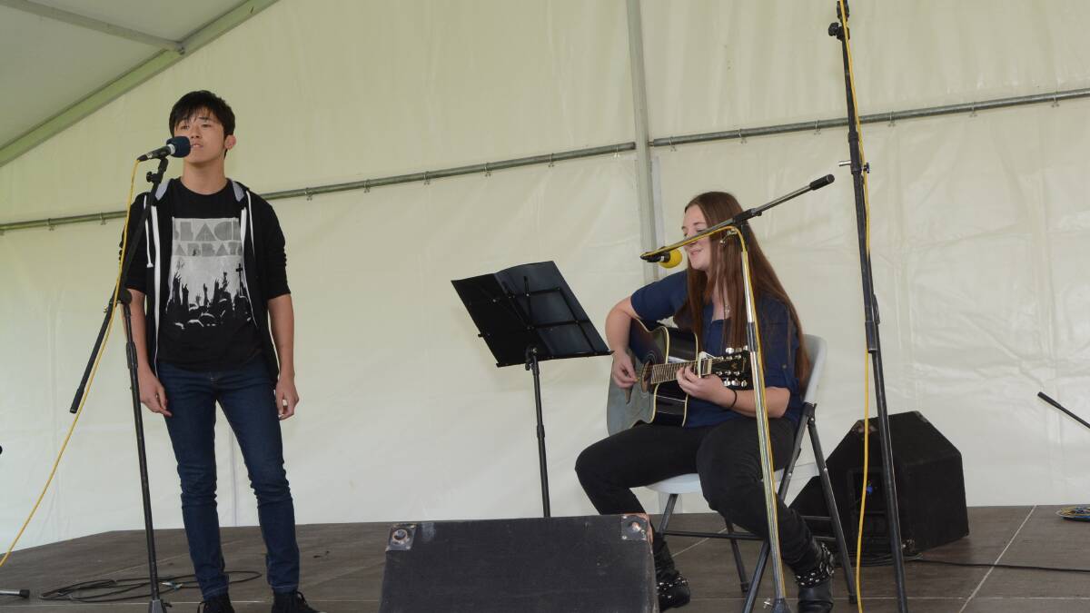 Emma Seager on Guitar and Dylan Miller on vocals at bathurst Youth concert.Photo:Phill Murray.