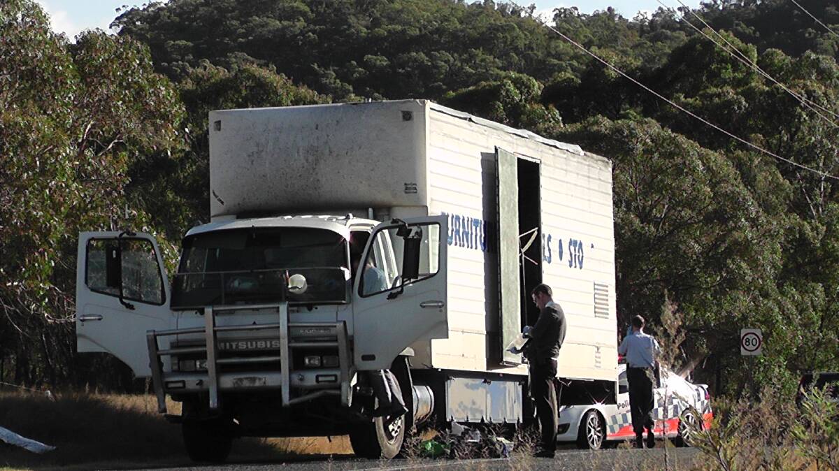 THE SEQUEL TO THE NEWNES FOREST PURSUIT: The dumped furniture van and police at the scene near the Wolgan Road.
