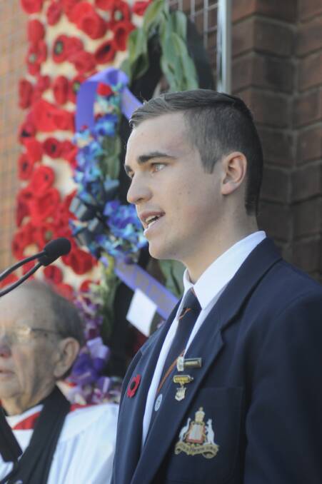POWERFUL SPEAKER: St Stanislaus College head prefect Simon Slack-Smith spoke with unbelievable confidence at Bathurst's Anzac Day service at the Carillon. Photo: CHRIS SEABROOK 04251canzac1