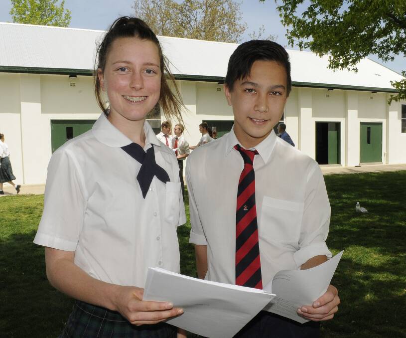 KEEPING CALM: All Saints’ College students Sarah Moody and Micah Wong thought yesterday’s HSC biology exam was a fair test and they’re ready for what comes next. Photo: CHRIS SEABROOK 102014caschsc