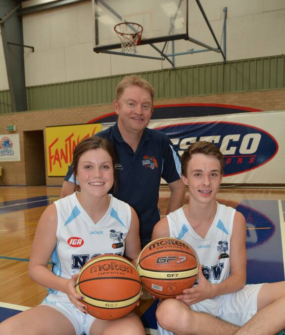 ON THEIR WAY: Bathurst basketballers Olivia Doble and Will Cranston-Lown, along with local coach Paul Masters, will be heading to New Zealand in April on the back of their efforts at the recent Country Cup in Albury. Photo: ZENIO LAPKA 012815zbasketball2