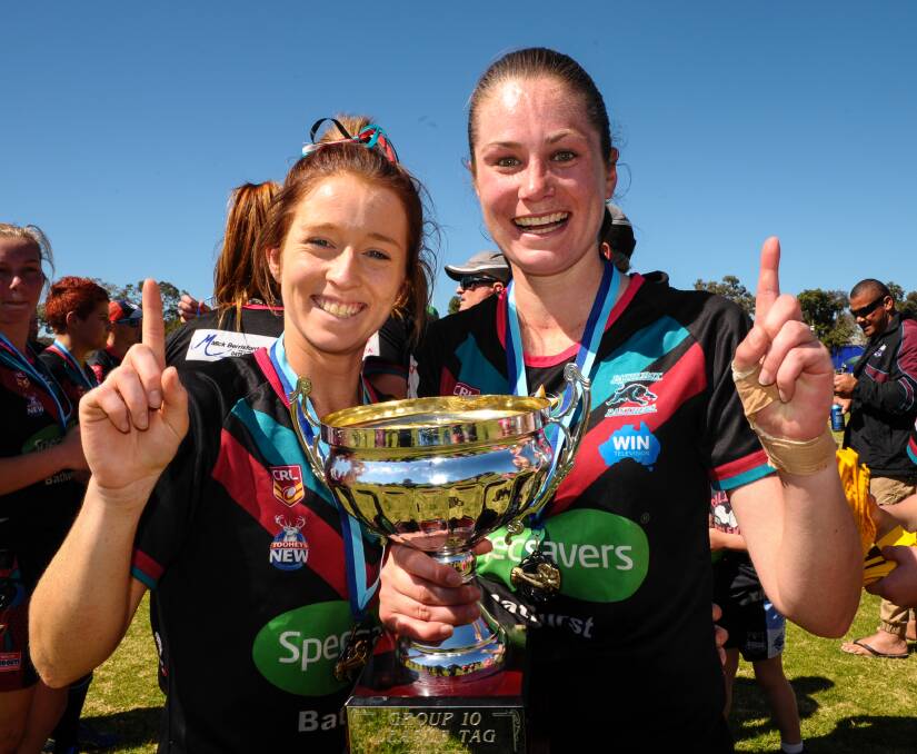 ON THE HUNT: The search is continuing for a Bathurst Panthers league tag coach as the club aims to make it three straight titles. Jess Hotham and Monique Christie-Johnson are pictured after last season’s Group 10 success. 091414zgirlswin1