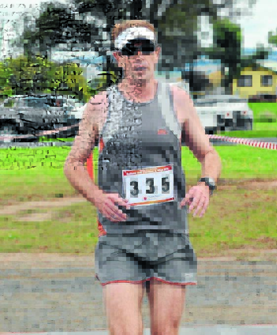 BIG WIN: Paul Moran was the first runner home in the 10km race at yesterday’s Bathurst Half Marathon. Photo: PHILL MURRAY 050315ppaul