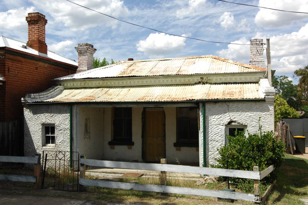 COMING DOWN: This derelict house at 311 Howick Street has been approved for demolition, despite heritage bodies putting up a fight. 010115zhowick