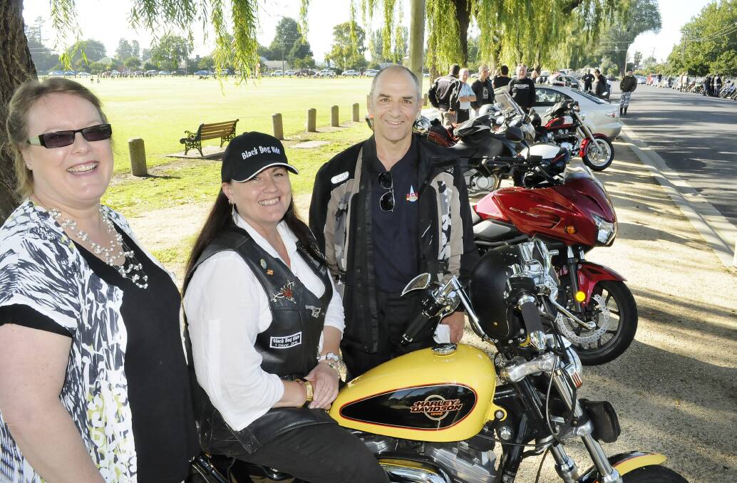 QUITE A RIDE: Lifeline Central West centre manager Bronwyn Giovenco, organiser of the local Black Dog 1 Day Ride Rose Hancock and Lifeline Central West chairman Bill Miller. Photo: CHRIS SEABROOK 032314cblakdog1