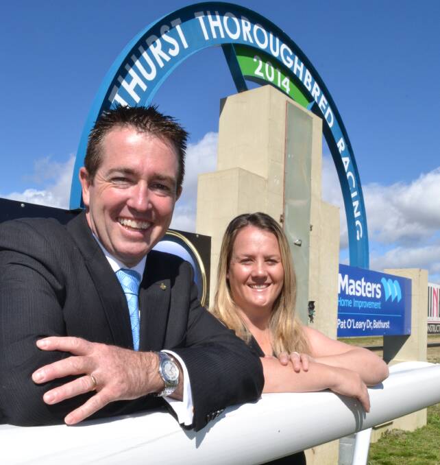 BIG BUCKS: Bathurst MP Paul Toole and Ali Webster from Bathurst Thoroughbred Racing at yesterday’s announcement that $100,000 would be up for grabs at the local meeting, which will host a final of the Central District Region Country Championships Final on March 16 next year. 082814turf3