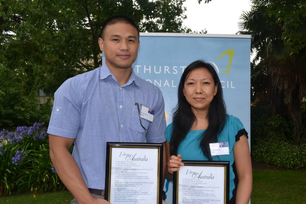 PROUD AUSTRALIANS: Atmaram Rana and his wife Bhagawati Rana, who came from Nepal six years ago, were given a warm welcome as some of Australia’s newest citizens at yesterday’s Australia Day ceremony in Machattie Park. Photo: RACHEL FERRETT 012315rfcitizen2