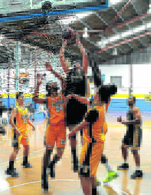 GOOD FORM: Former Bathurst Goldminer Sam McCorkindale in action for the Sydney City Cobras in round 14 of the season 2014-15 Ultimate Basketball League competition. He scored 19 points. Photo courtesy of Noel Rowsell (www.photoexcellence.com.au) 091614sammccorkindale3
