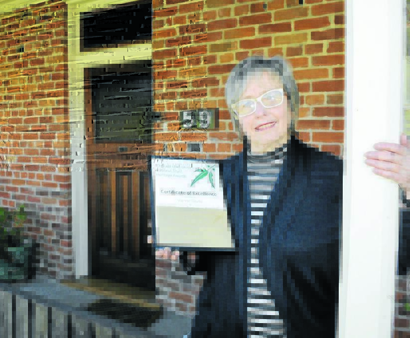 HERITAGE PRIDE: Vianne Tourle won the award for conservation of a heritage building. Photo: CHRIS SEABROOK  083015cheritage1