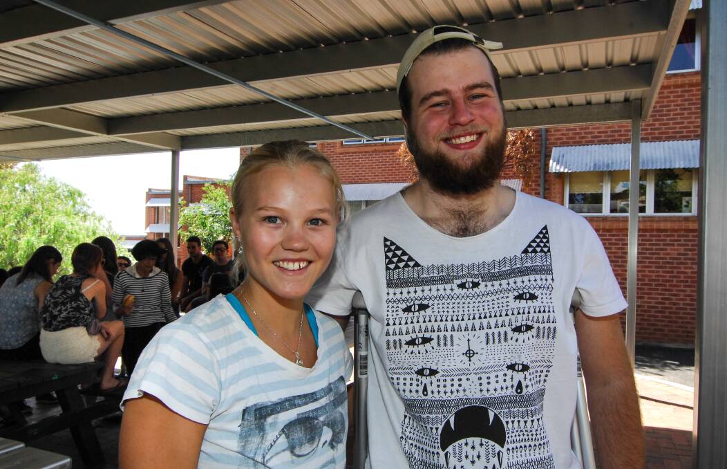 A REASON TO SMILE: Bathurst High School students Caitlin Davis and Hamish Starr both achieved Band 6 results in their Higher School Certificate and couldn’t be happier. Photo: ZENIO LAPKA 121714zbxhi1