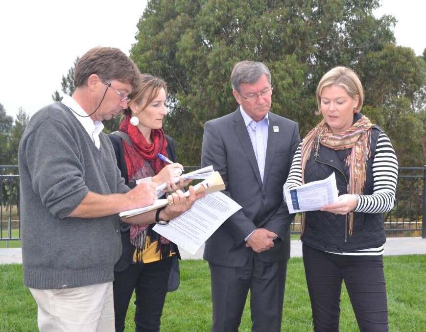 PROCLAMATION: Master of ceremonies Christopher Morgan and Bathurst Regional Council mayor Gary Rush run through the bicentennial program with manager of corporate communication Victoria Erskine and bicentennial consultant Anabelle Hillsdon. Photo: LOUISE EDDY 050415lerehearse3