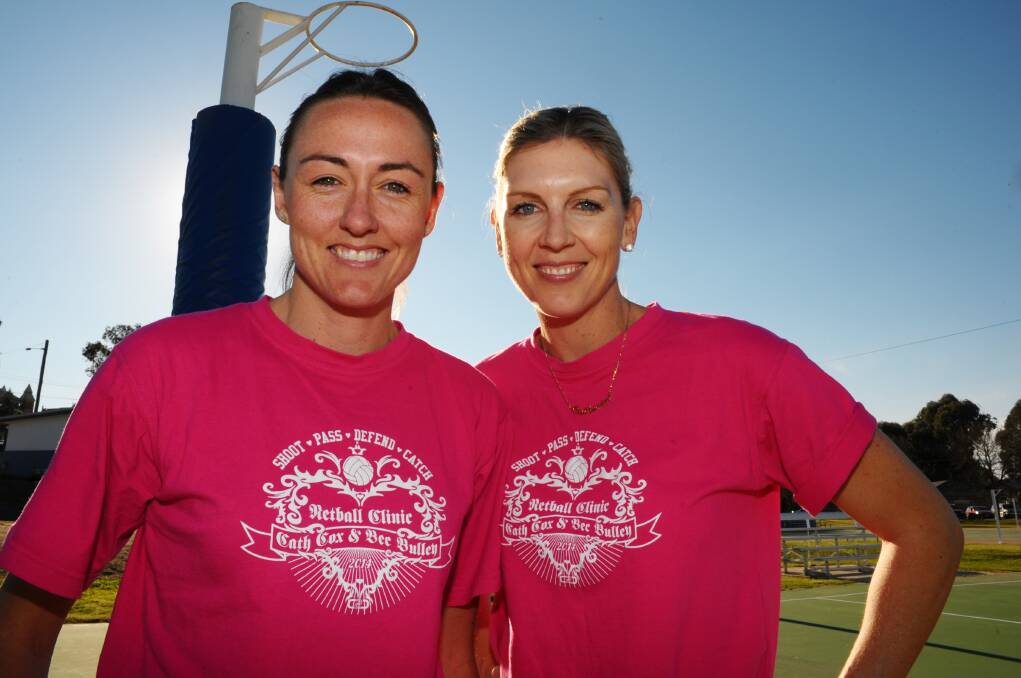 STAR TEACHERS: Australian netball representatives Rebecca Bulley and Catherine Cox were in Bathurst yesterday as part of a two-day coaching clinic with a number of local juniors. Photo: ZENIO LAPKA 092214znet