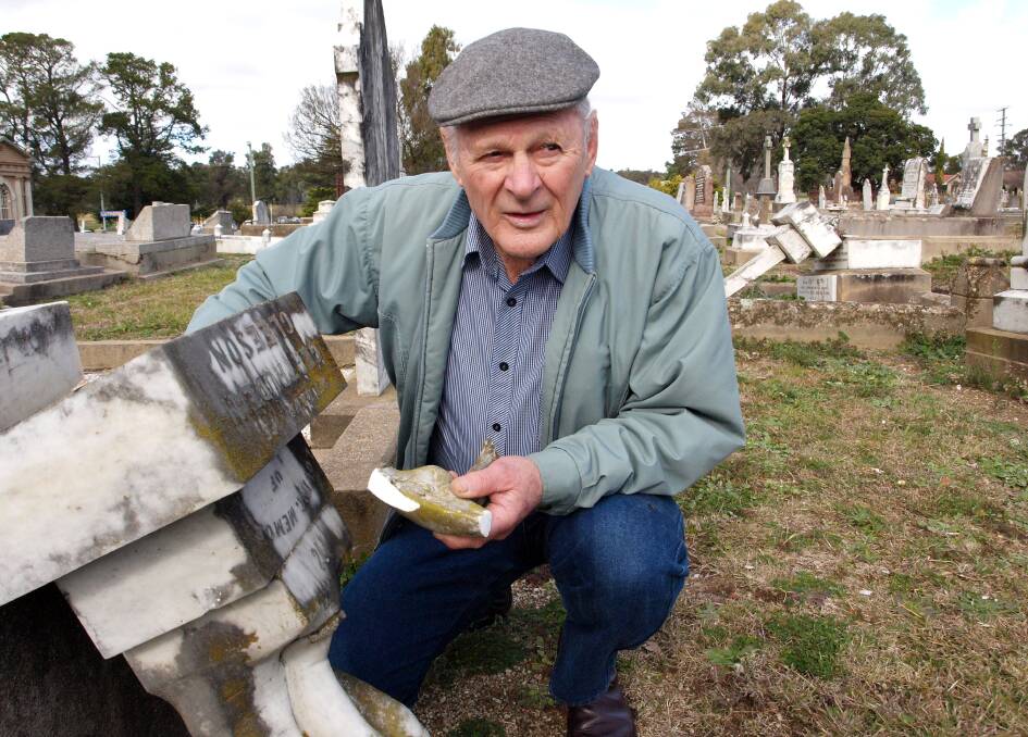 SUPPORT: Barry Konemann, from the Bathurst Family History Group, says the group will need all the help it can get to repair damage at the cemetery. Photo: ZENIO LAPKA 062614zgrave1