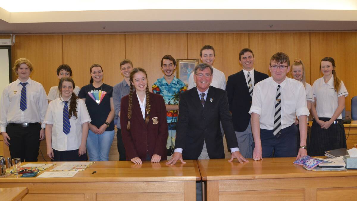 YEAR’S END: Bathurst Regional Youth Council mayor Jayne Dwyer, Bathurst mayor Gary Rush and Bathurst Regional Youth Council deputy mayor Gerard O’Shea with some of the members of this year’s youth council at their last meeting for the year. Photo: LOUISE EDDY 111114leyouth
