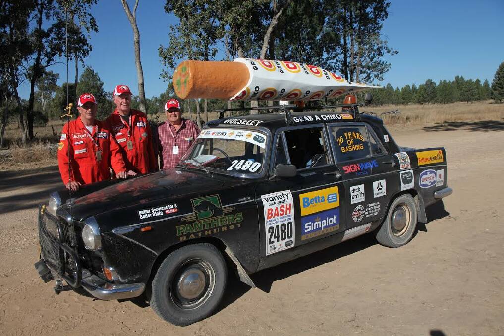 VARIETY BASH: Steve Lindsell, John Lindsell and Graham Dempsey with the veteran Chiko Roll car that will be taking part in the Variety Bash which starts tomorrow. 