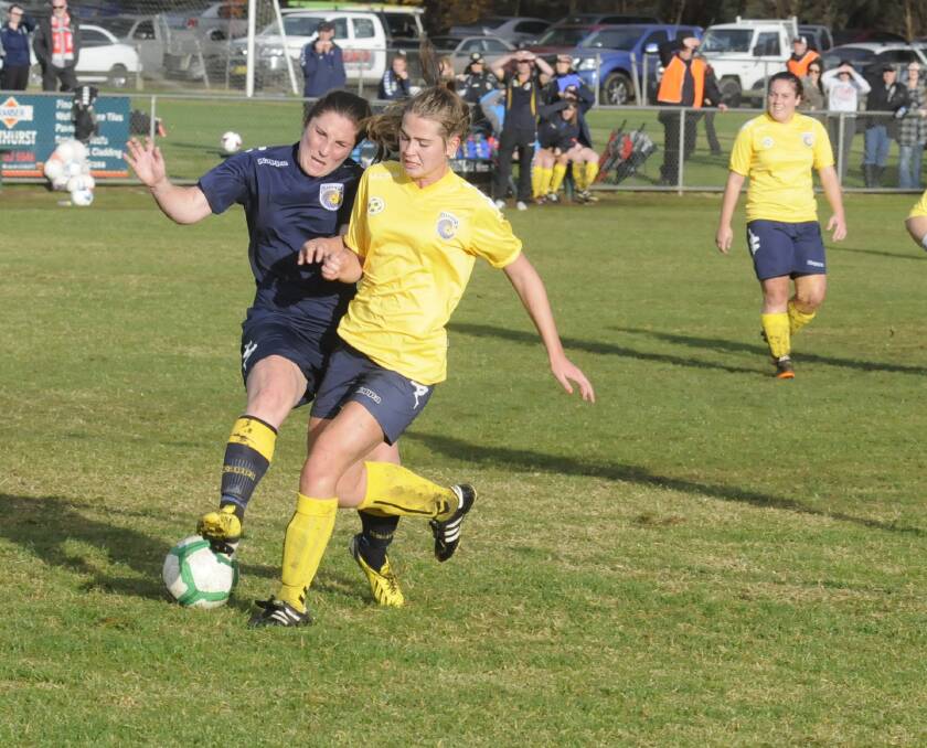 FAMILY AFFAIR: Western Mariners player Kya Godbier will return to the side in 2015, with her dad Mick to take over the coaching reins from Tony Clancy. Photo: CHRIS SEABROOK 060114cwsoc4
