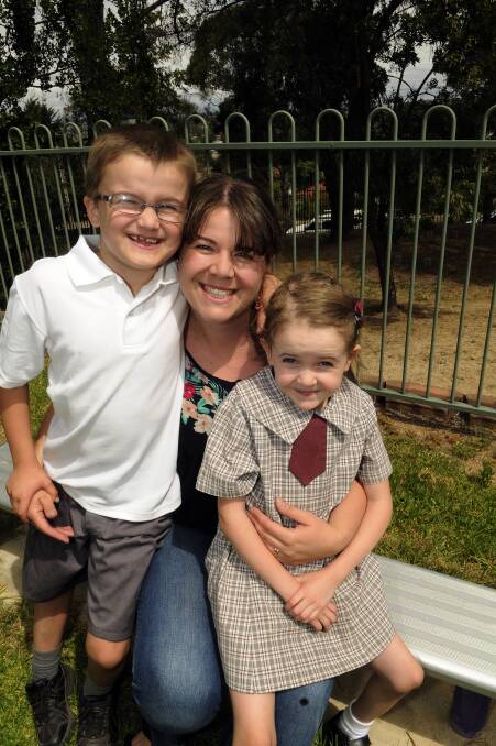 READY TO LEARN: Louise Blencowe with her children Samuel and Evelyne, who attend West Bathurst Public School. Photo: PHILL MURRAY 020414pevie