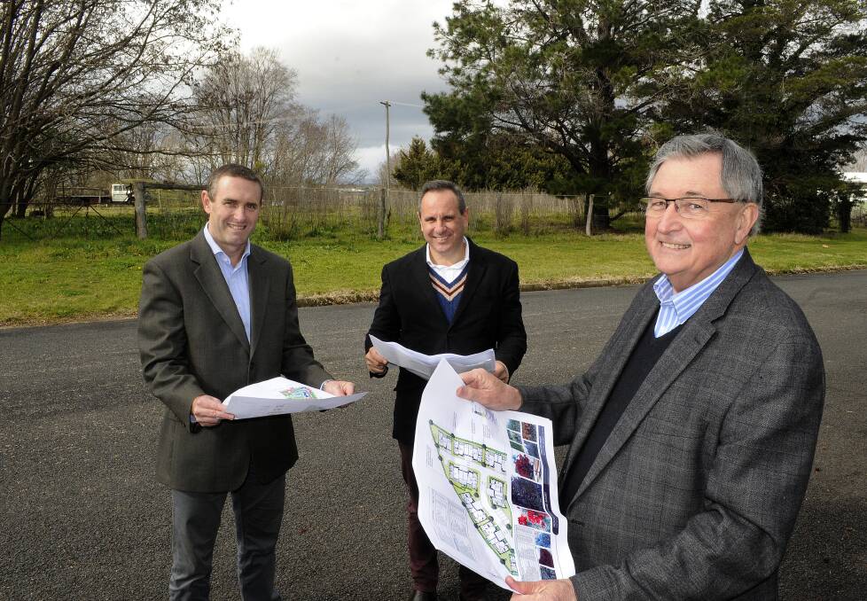 A PLACE FOR SENIORS: Oak Tree Group directors Mark Bindon and Franco De Pasquale with Bruce Bolam at the site of a proposed 55-unit development in Stanley Street yesterday. 082614coaktree