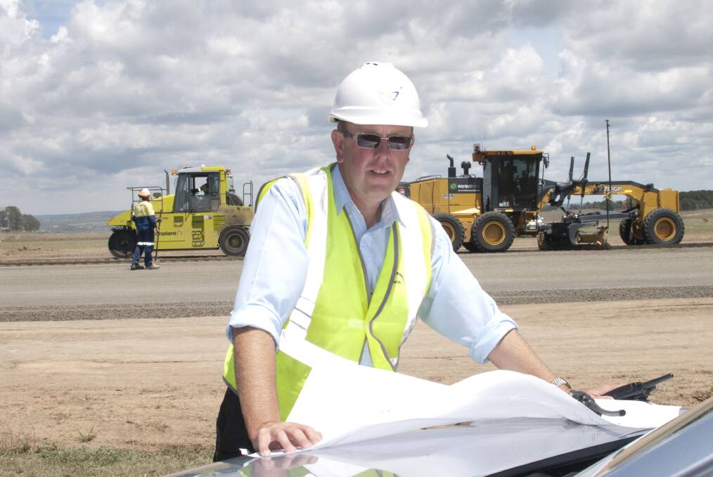 ON TRACK: Bathurst Regional Council’s Darren Sturgiss at the Bathurst Airport yesterday checking on progress of the $3 million runway resurfacing project, which is on track to be completed by February 15.          011915zsturgess2