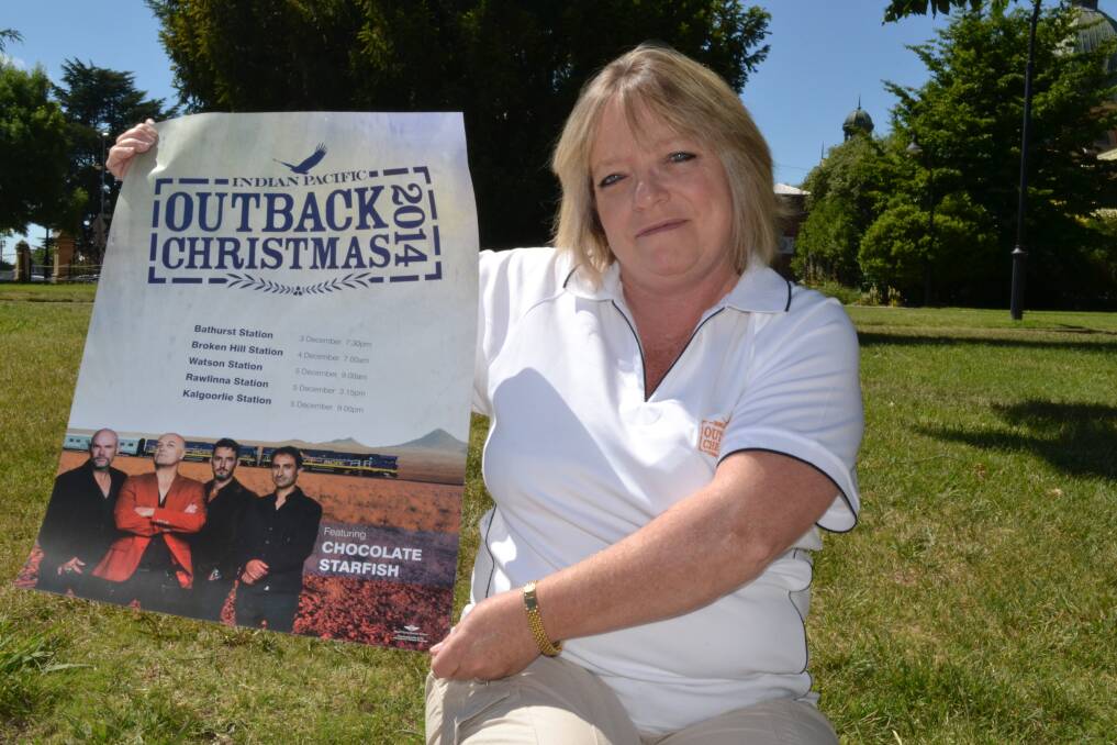 CHRISTMAS TRAIN: Tracey Bannon-Read is looking forward to tomorrow’s visit by the Indian Pacific Outback Christmas Train, which will come bearing the band Chocolate Starfish and Santa. Photo: BRIAN WOOD 112814train