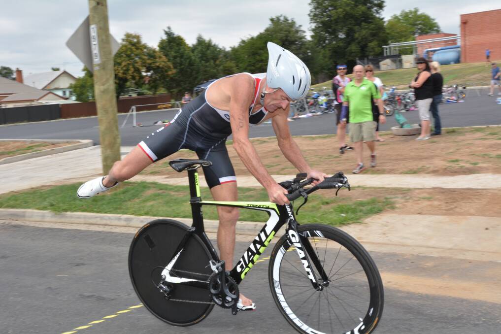 KILLING IT: Mark Windsor’s red-hot form continued on Saturday when he took out his age category in the sprint race at the Huskisson Triathlon Festival. Photo: ZENIO LAPKA 022415zwindsor