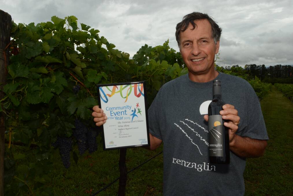 TOP DROPS: National Cool Climate Wine Show chair Mark Renzaglia celebrates an Australia Day award for Community Event of the Year. Photo: PHILL MURRAY 012715pmark2
