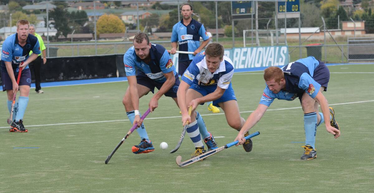 FINALS TIME: Cameron Liles (middle) and St Pat’s White will be taking on Souths Aces in the Bathurst Hockey Association’s men’s first grade major semi-final tomorrow. Photo: PHILL MURRAY 041214psouths13