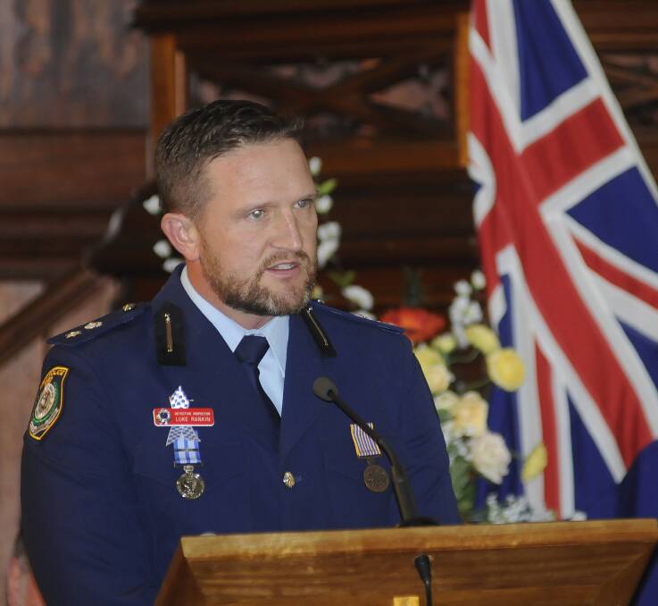 DUTY: Chifley Local Area Command Acting Superintendent Luke Rankin gave the memorial address yesterday. Photo: CHRIS SEABROOK. 092914cops6