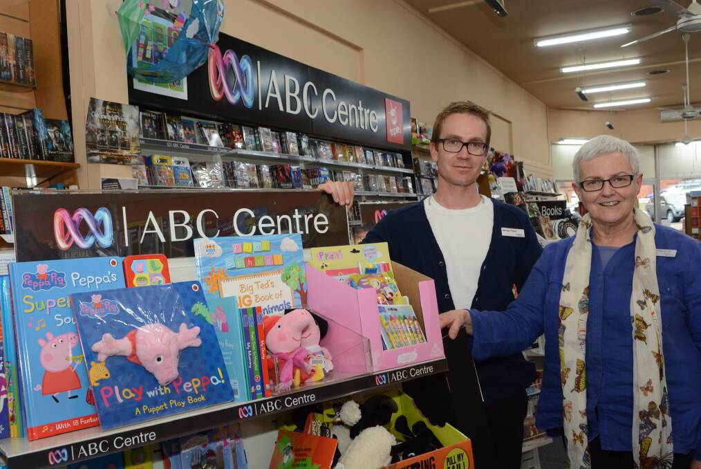 ABC CENTRE TO GO: James Paull and Kathryn Bancroft will say goodbye to the ABC Centre within Books Plus later this year. Photo: PHILL MURRAY 072415pabc
