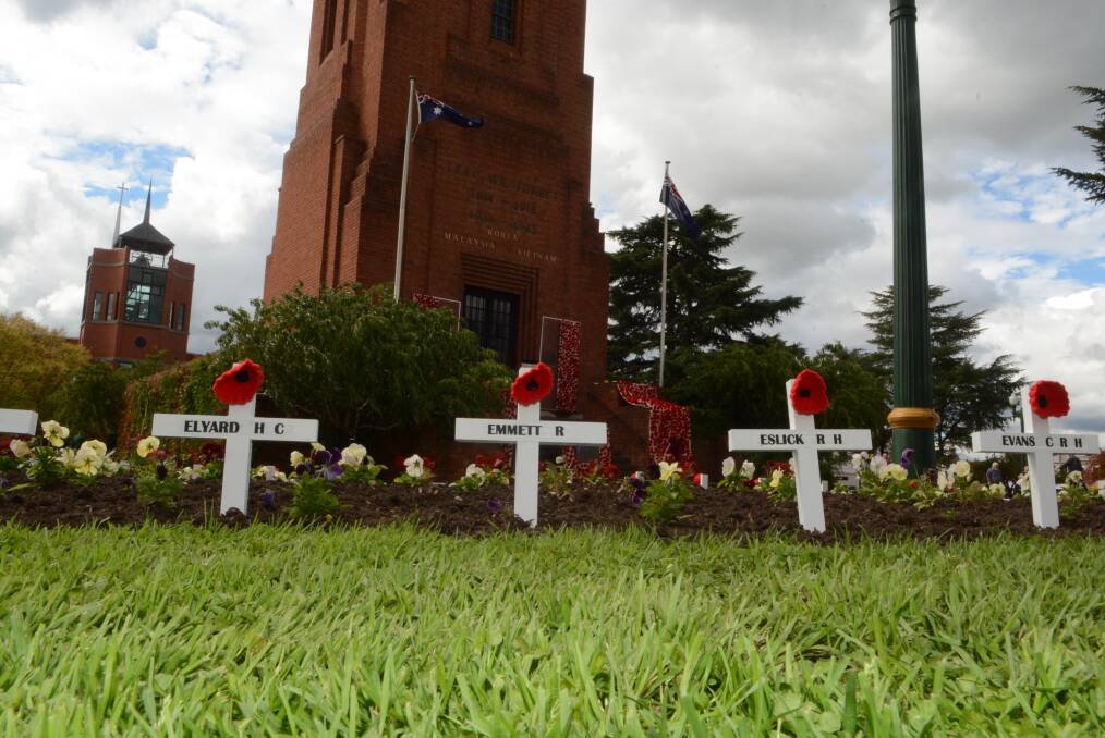 HONOURING: Four hundred and thirty-six white crosses, each bearing the name of a fallen soldier, have been placed in the gardens surrounding the Carillon.