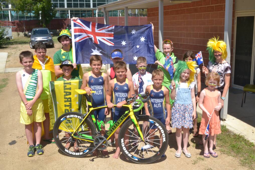 GREEN AND GOLD: King Cain Wallabies junior members showing off their colours before the club’s Australia Day race this morning. Photo: ALEXANDER GRANT 012515wallabies
