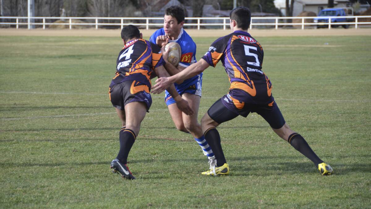 DEFEATED: Pat's winger Mick Armstrong takes a hit-up in Saturday's defeat to the Lithgow Workies. Photo: JEFF GEDDES 