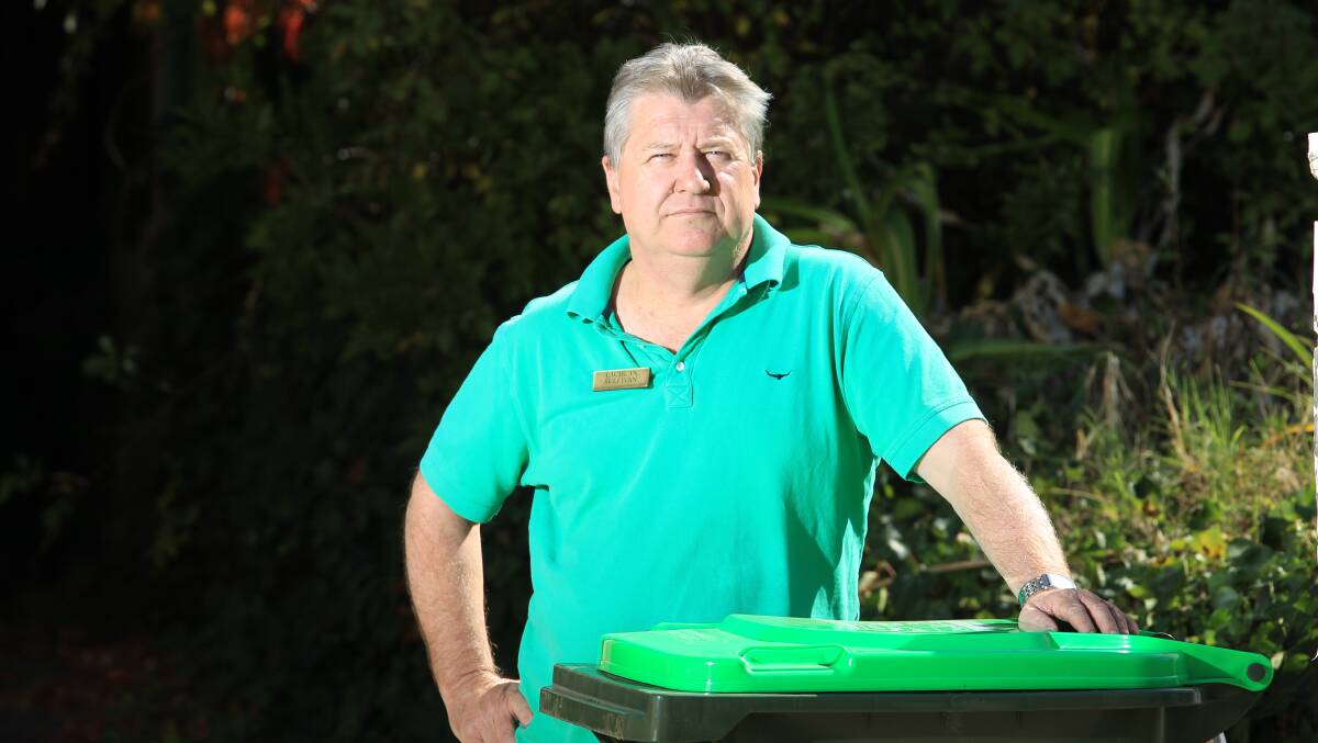 NO THANKS: Lachlan Sullivan will be returning his unwanted green waste bin to Bathurst Regional Council. Photo: PHIL BLATCH 040316pbbin