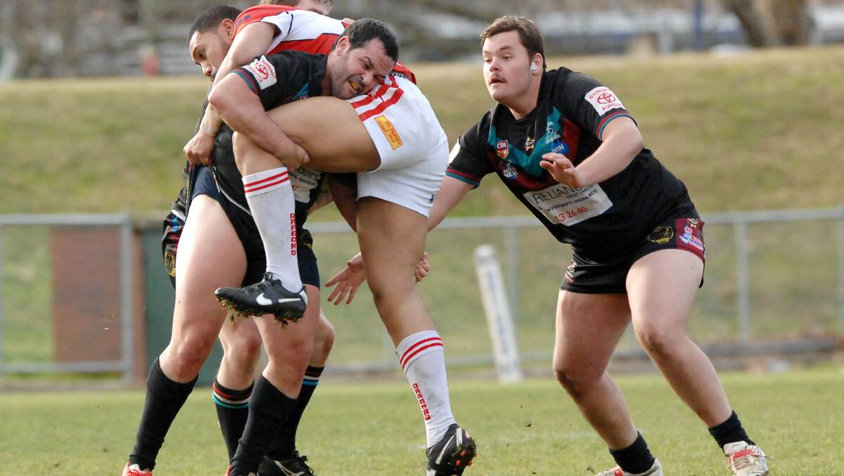 SHUTTING THEM DOWN: Bathurst Panthers’ backrower Trent Rose was brilliant against Mudgee yesterday, and closely marked Mudgee danger man Demetrius Ainuu. Photo: ZENIO LAPKA 